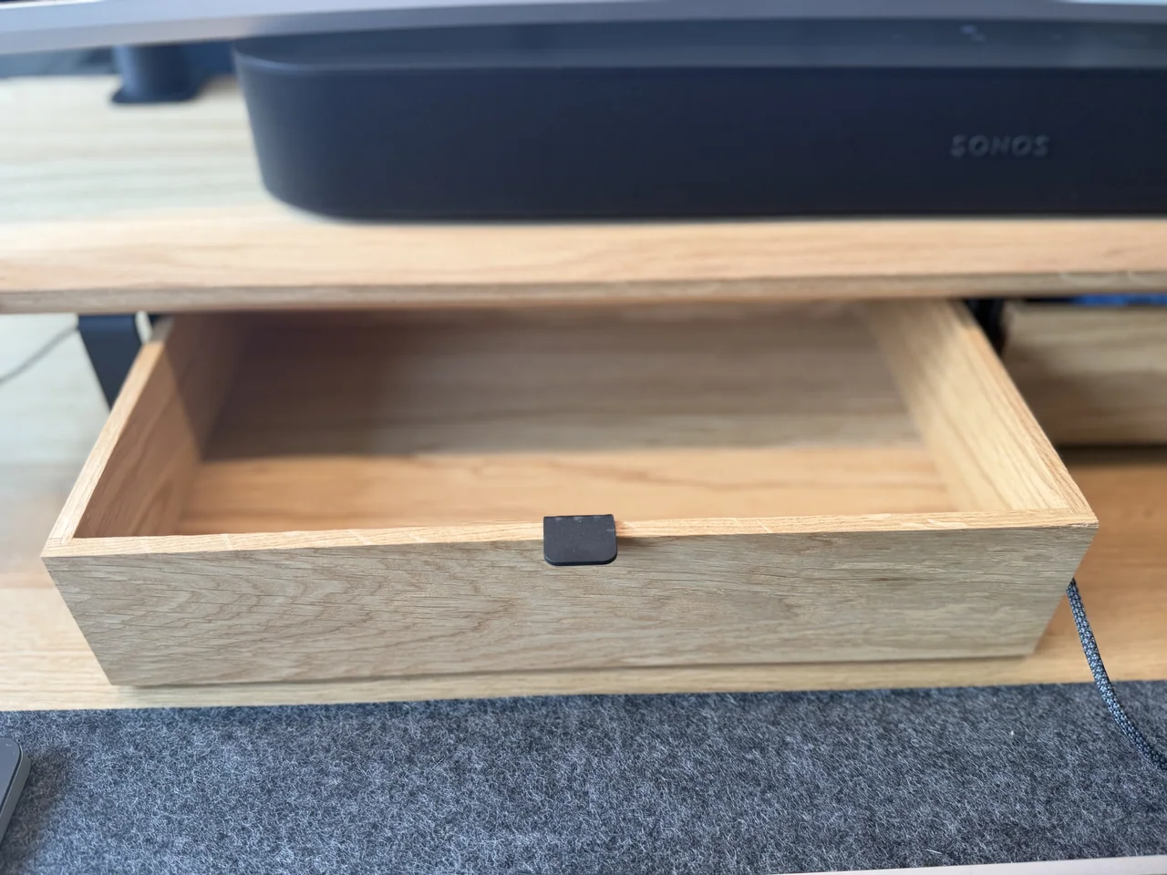 Modular drawer accessories mounted under the desk