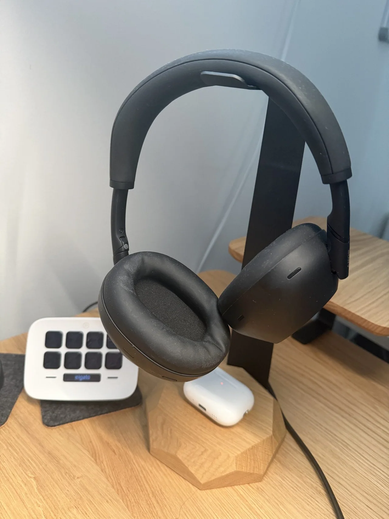 Sony WH-1000XM6 headphones with AirPods and Stream Deck in my desk setup 2026